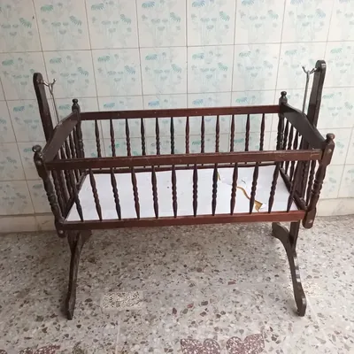 New born wooden swing